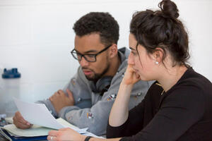 Male and female students studying during finals week.