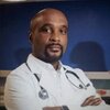 Dr. Travis Gayles