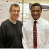 Professor Josh Gulley and Olubankole Arogundade at 2014 Honors Poster Presentation